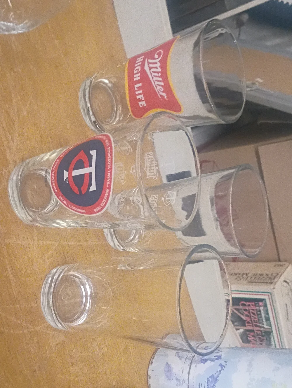 Set of Clear Branded Shot Glasses with Red & Yellow Logos